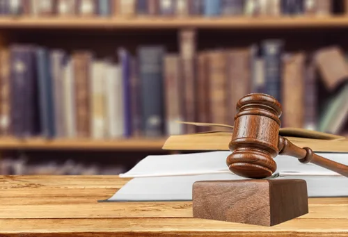 Gavel resting on law books